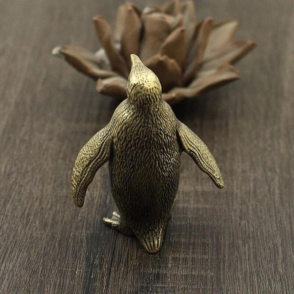 antique penguin figurine - Brown Copper