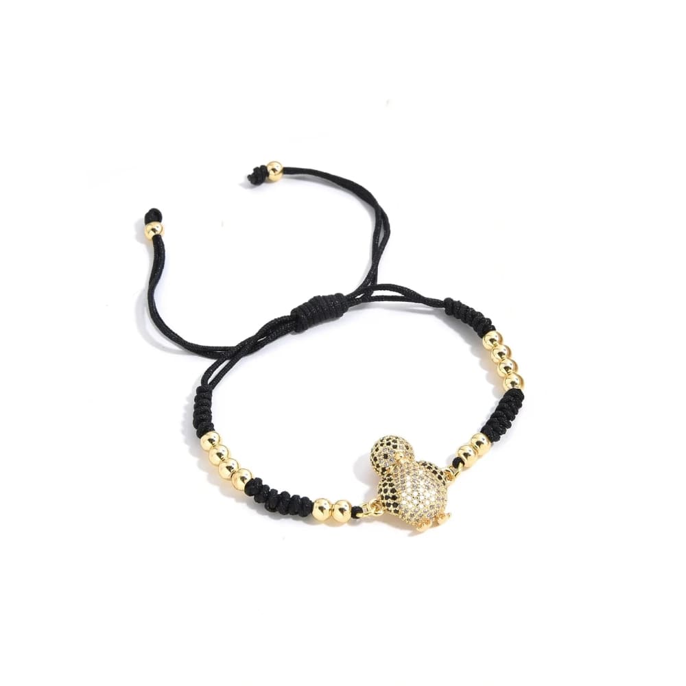 Gold penguin bracelet