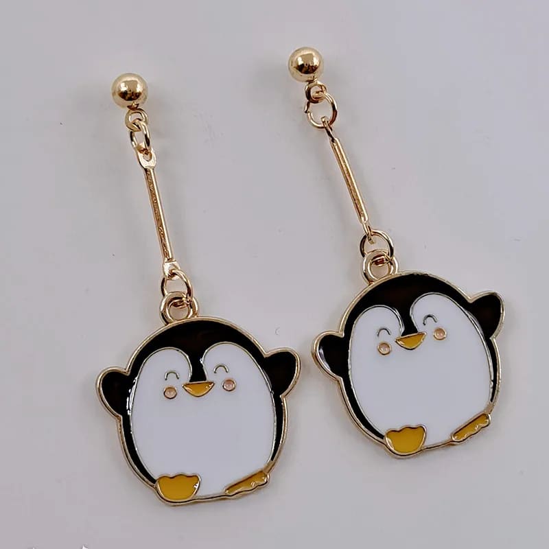 Gold penguin earrings