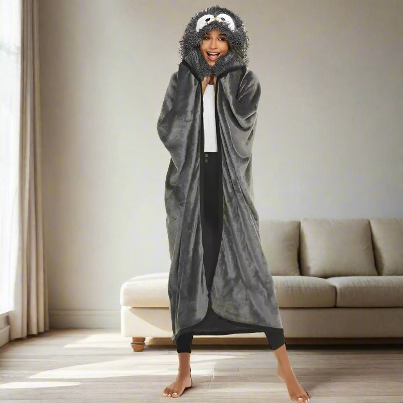 Female-model-with-a-hooded-penguin-blanket-in-front-of-the-couch