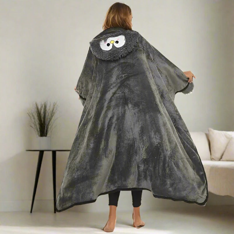 Female-model-going-on-a-couch-with-the-hooded-penguin-blanket