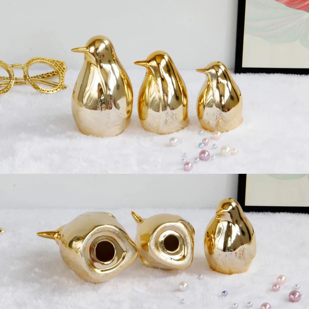 penguin figurine with gold