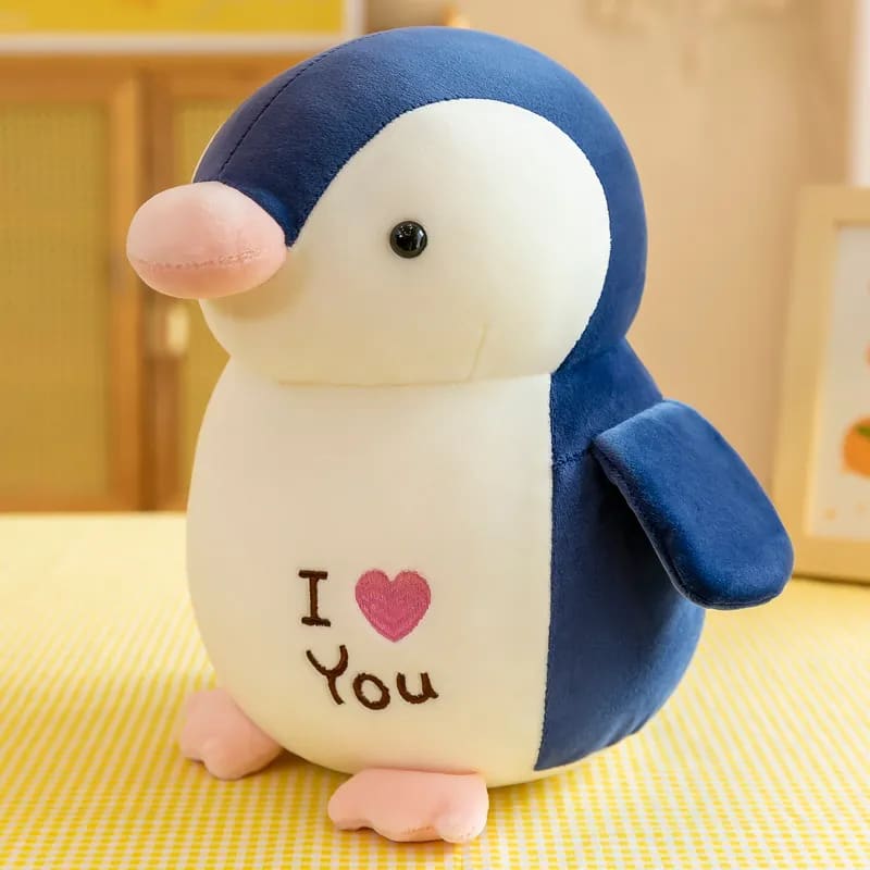 Plush penguin with heart